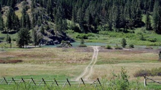 Two Feathers Lodge: road to river